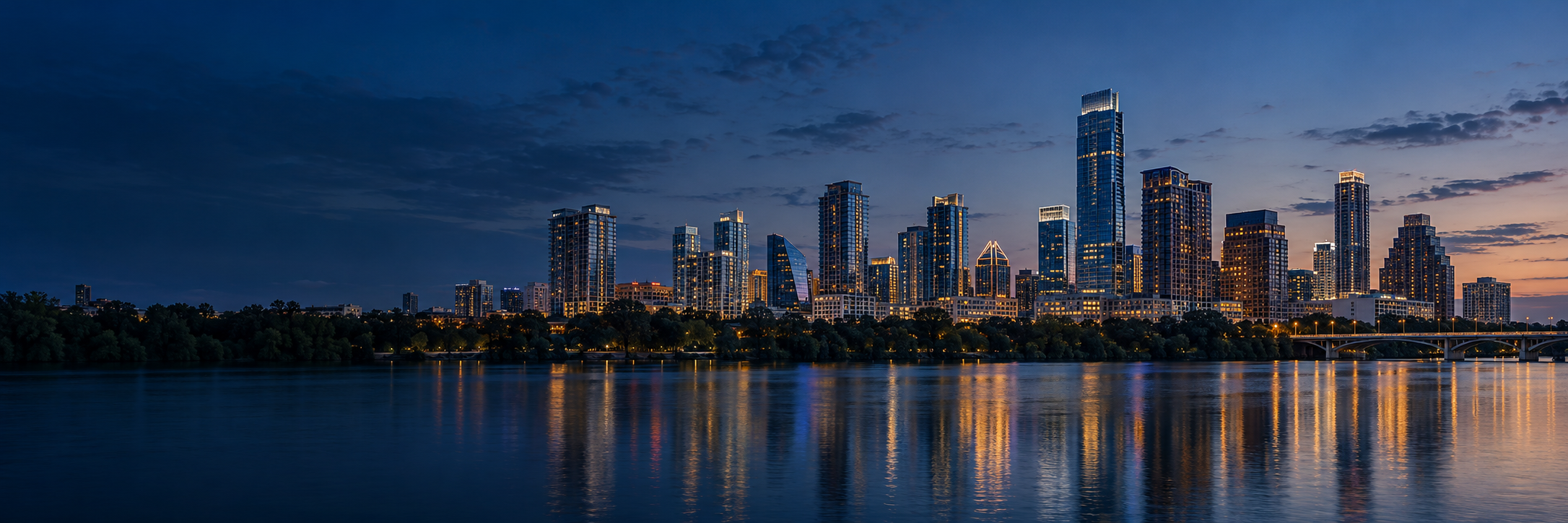 Austin skyline across Lady Bird Lake at blue hour